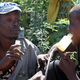 Homeless people in Somalia sniffing glue.